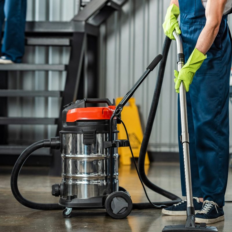 cropped-view-of-cleaner-in-uniform-cleaning-floor-with-vacuum-cleaner.jpg